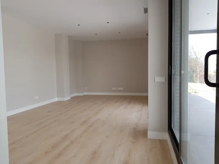 Salón con corredera al porche